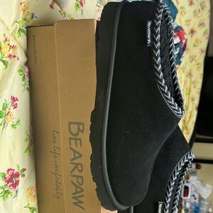 Black bearpaw shoes.